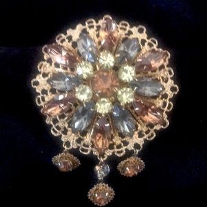 Emmons signed brooch, boosts topaz Rhinestones and gold tone filigree